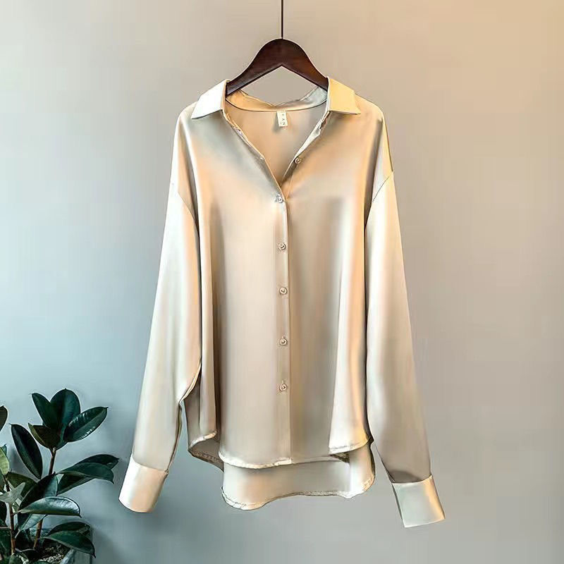 Women's elegant fall blouse, a timeless classic piece for sophisticated autumn style.