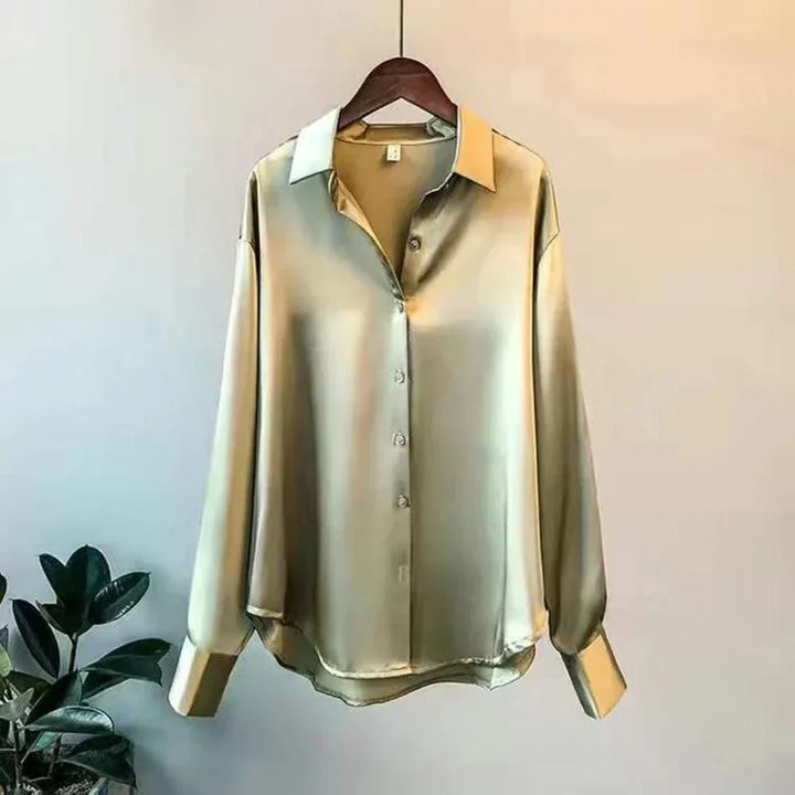 Autumn fashion: women's classic elegant blouse, a sophisticated long sleeve top for women.