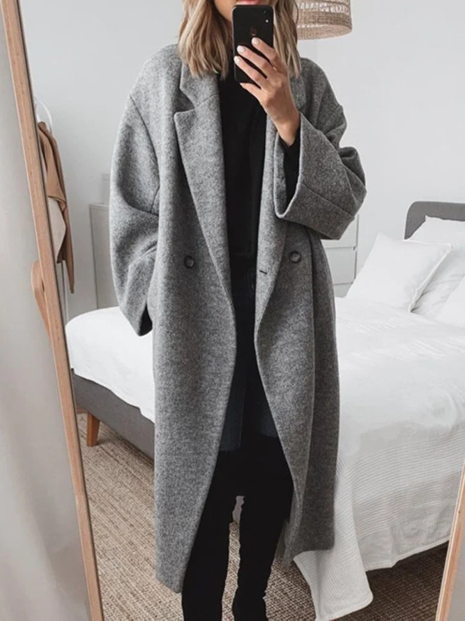 Elegant women's classic tailored overcoat for autumn and winter, perfect for sophisticated style and warmth.