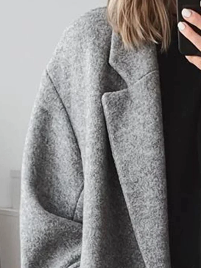 Sophisticated ladies' tailored overcoat, a classic winter coat for elegant autumn outerwear.