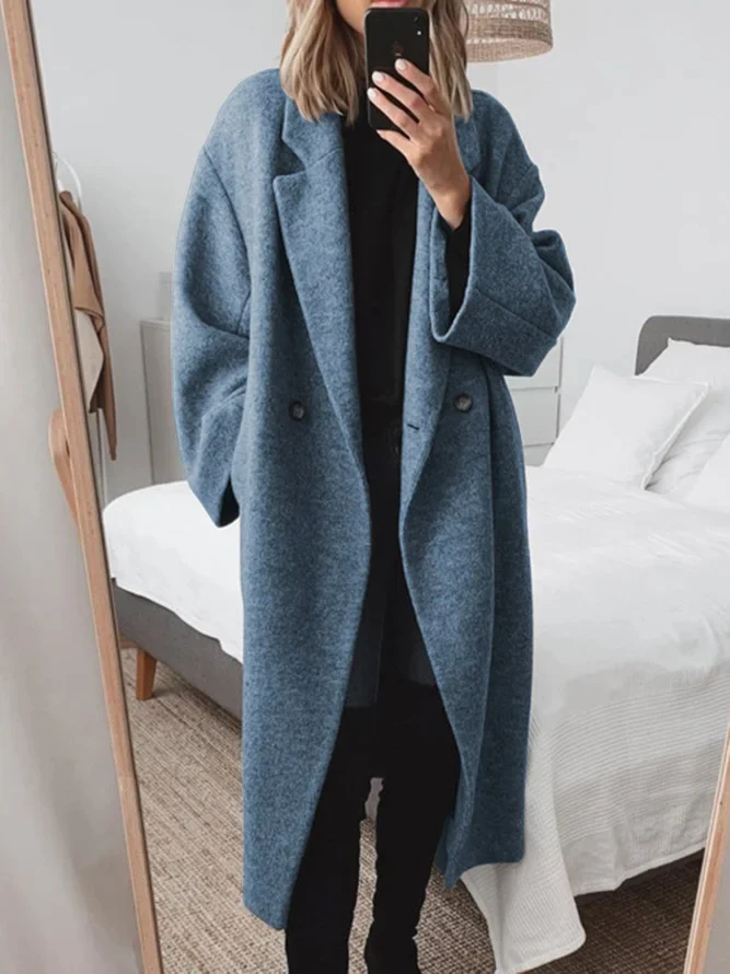 Blue women's classic tailored long overcoat, elegant & warm winter coat for sophisticated autumn style.