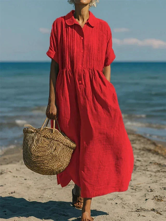 Comfortable loose-fit women's pleated maxi dress with a collared button-front design.