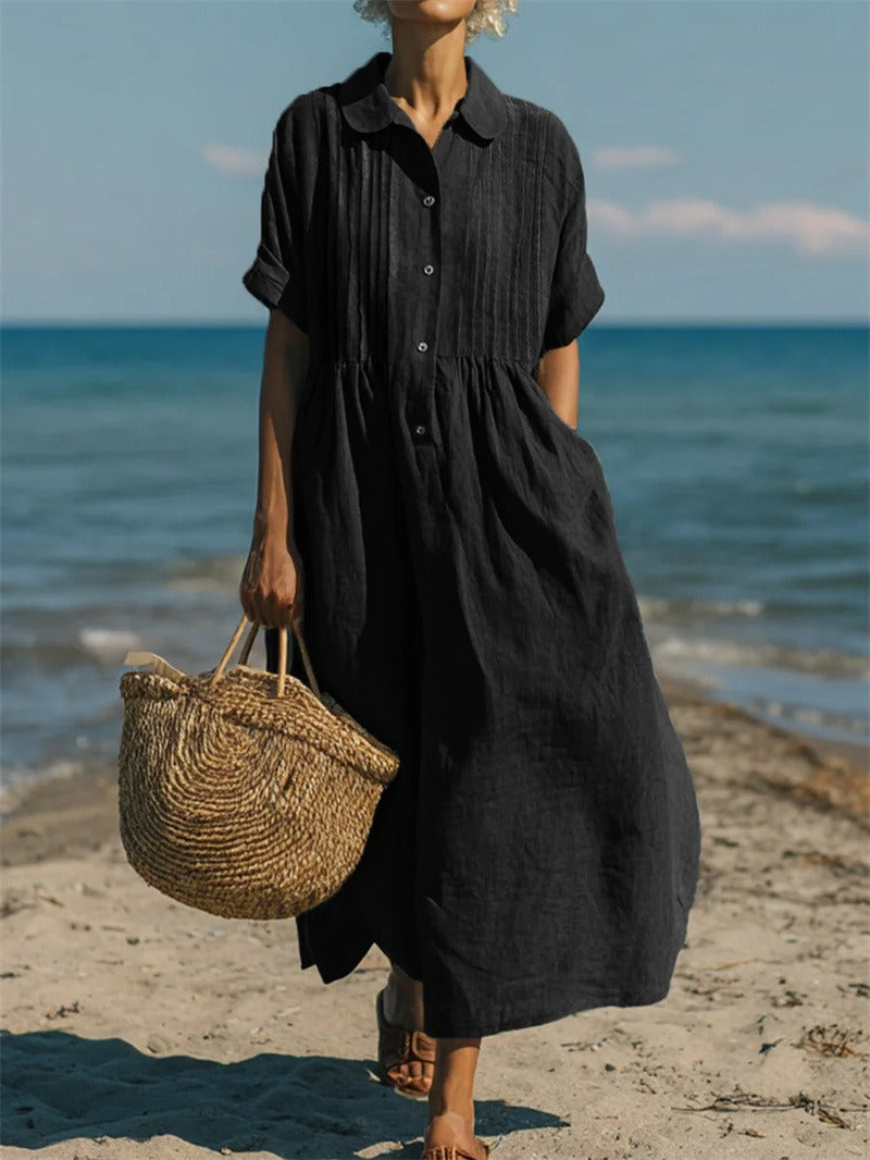 Elegant women's autumn/summer maxi dress with a collared, buttoned, and pleated design.