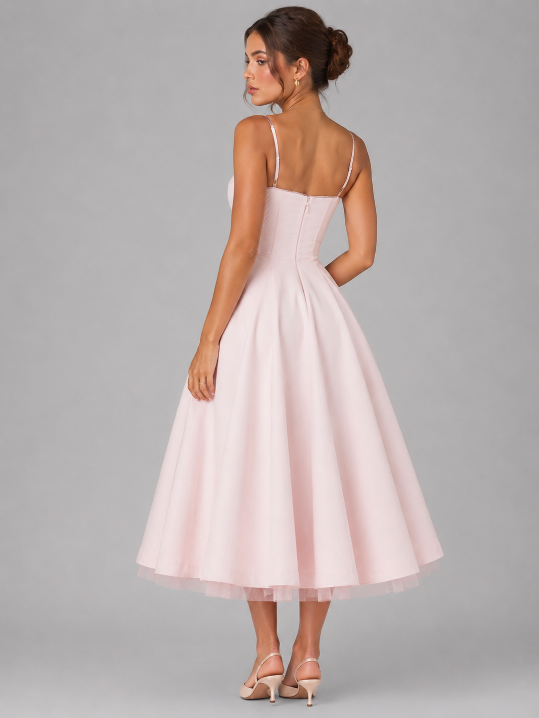Elegant summer midi dress for women, featuring a flattering corset top & a charming full skirt. Vacation ready.