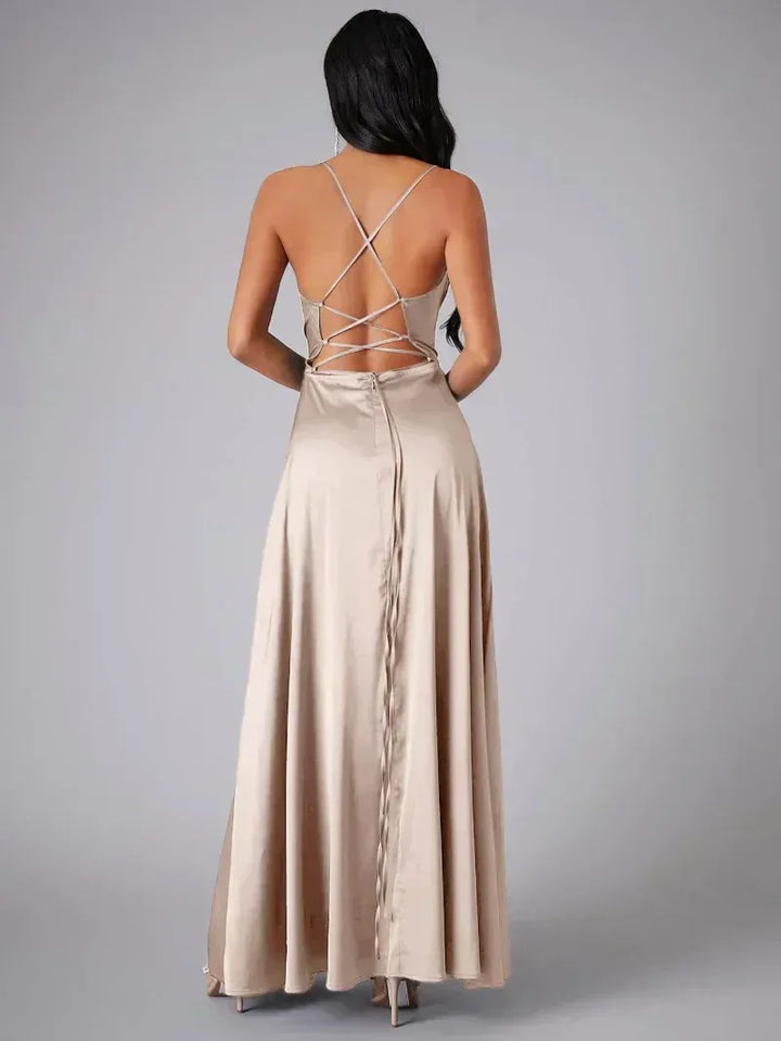 Chic women's backless maxi dress with cowl neck & high slit, ideal for special occasion and evening fashion.