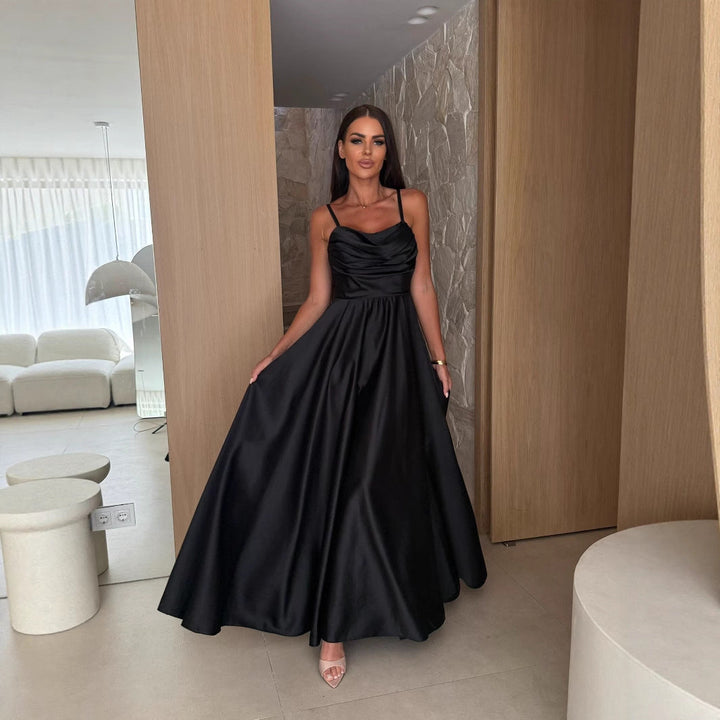 Flowing elegant pleated maxi dress for women, featuring a chic cowl neck, suitable for special occasion wear.