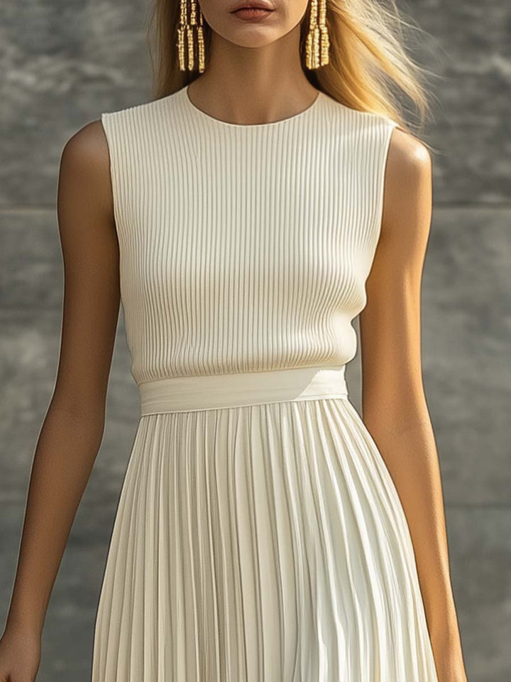 Flattering women's elegant cream pleated maxi dress, sleeveless with a crew neck, ideal for casual summer wear.