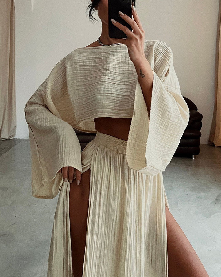 Women's elegant long sleeve crop top & side split maxi skirt set. A sophisticated two-piece for spring & fall.
