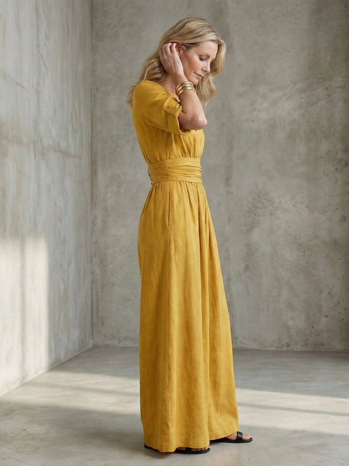 Stylish full-length wide leg jumpsuit with elegant cross front detail for women.