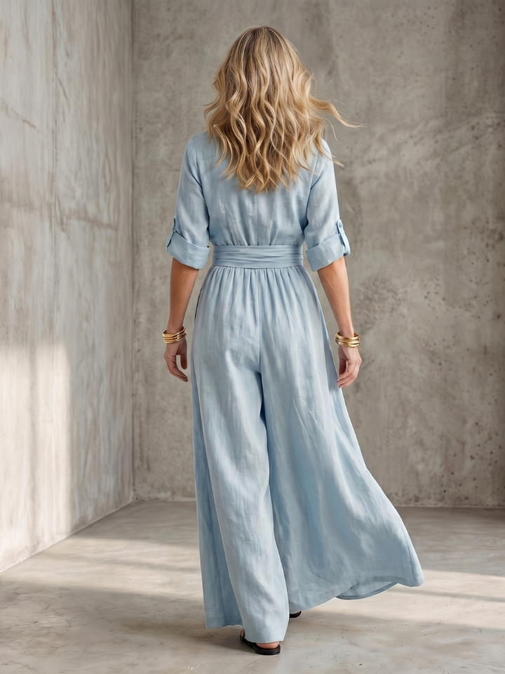 Women's comfortable cross front wide leg jumpsuit, ideal for a relaxed yet elegant summer look.