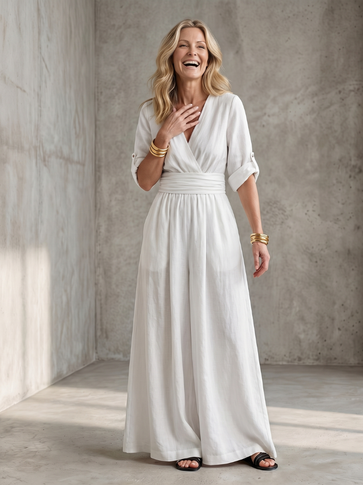 Fashionable women's cross front jumpsuit, wide leg silhouette, great for party & resort wear.