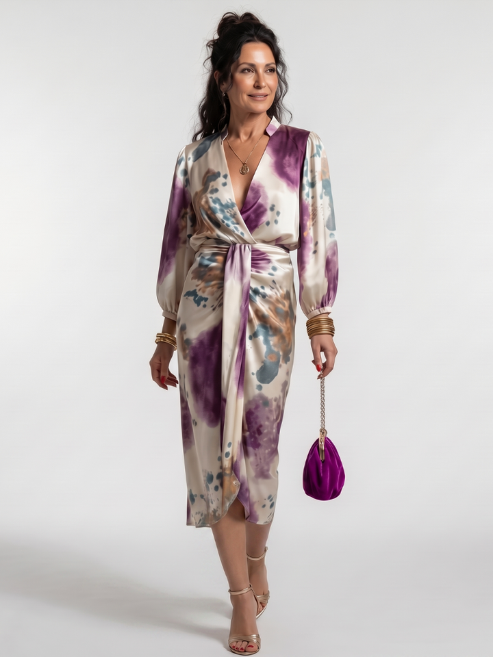 Elegant women's cross wrap midi dress with long sleeves and a beautiful print, perfect for day or evening.