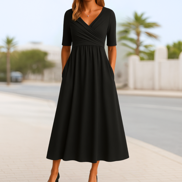 Chic women's V-neck midi dress with short sleeves, featuring a flattering cross front for elegant summer style.