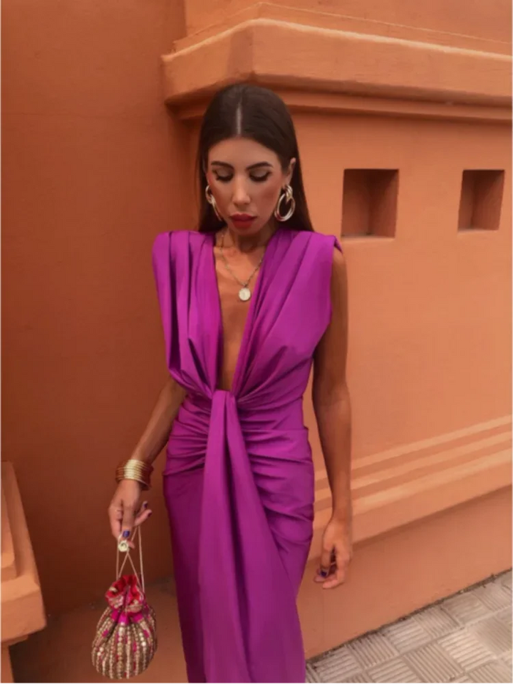Elegant women's long evening dress with deep V-neck & ruched bodice, ideal for wedding guests & formal events.