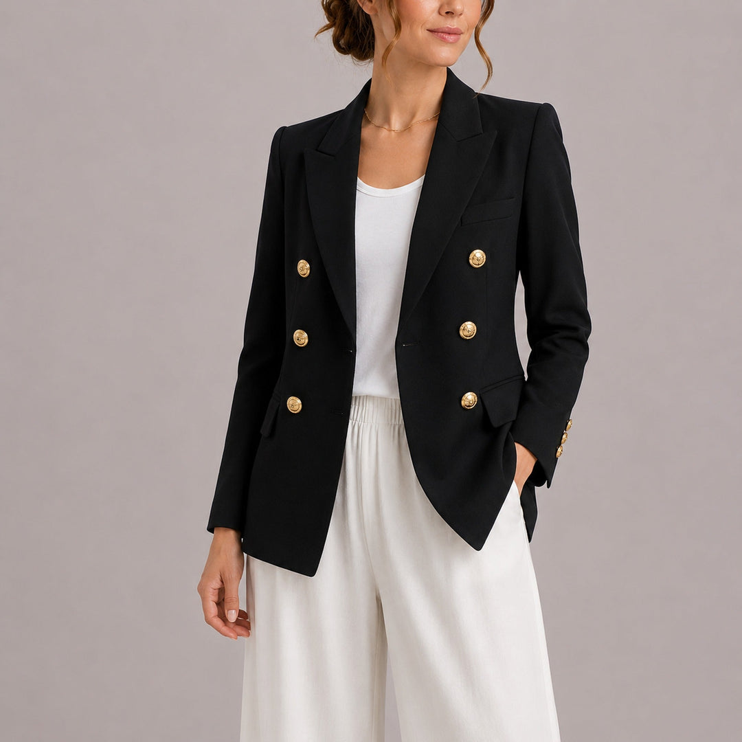 Fashionable women's outerwear: elegant double-breasted blazer with luxurious gold buttons. Timeless style.