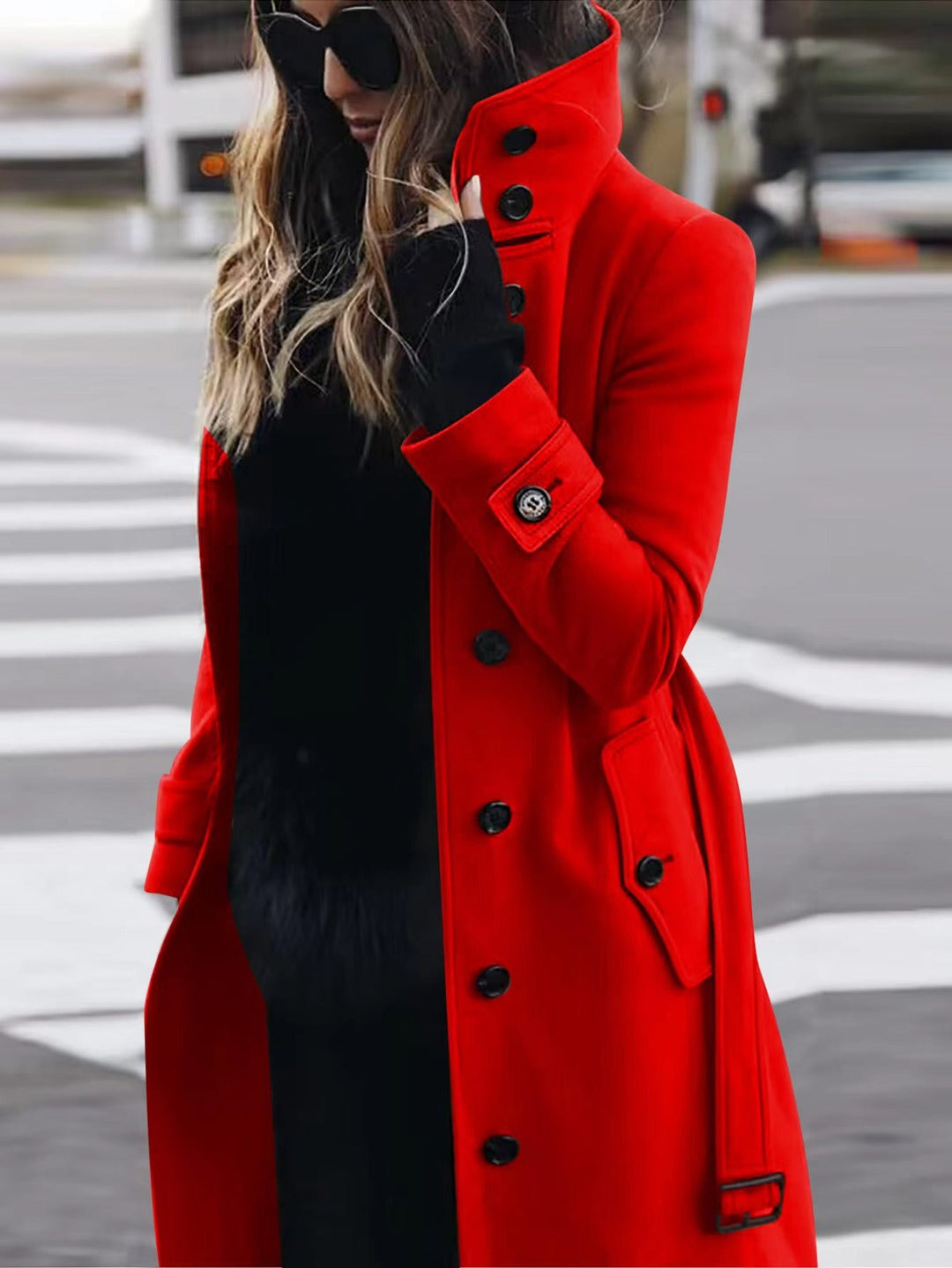 Elegant women's double-breasted coat featuring a stylish high stand-up collar in a classic black hue.
