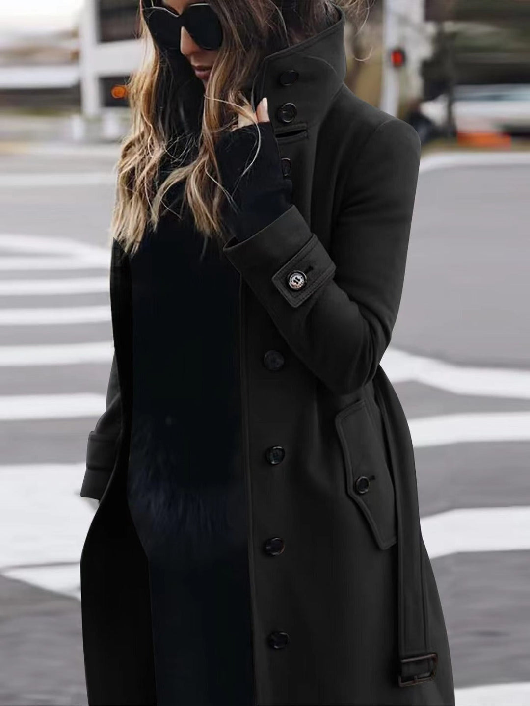 Fashionable women's winter coat: sophisticated double-breasted design with a chic stand-up collar.