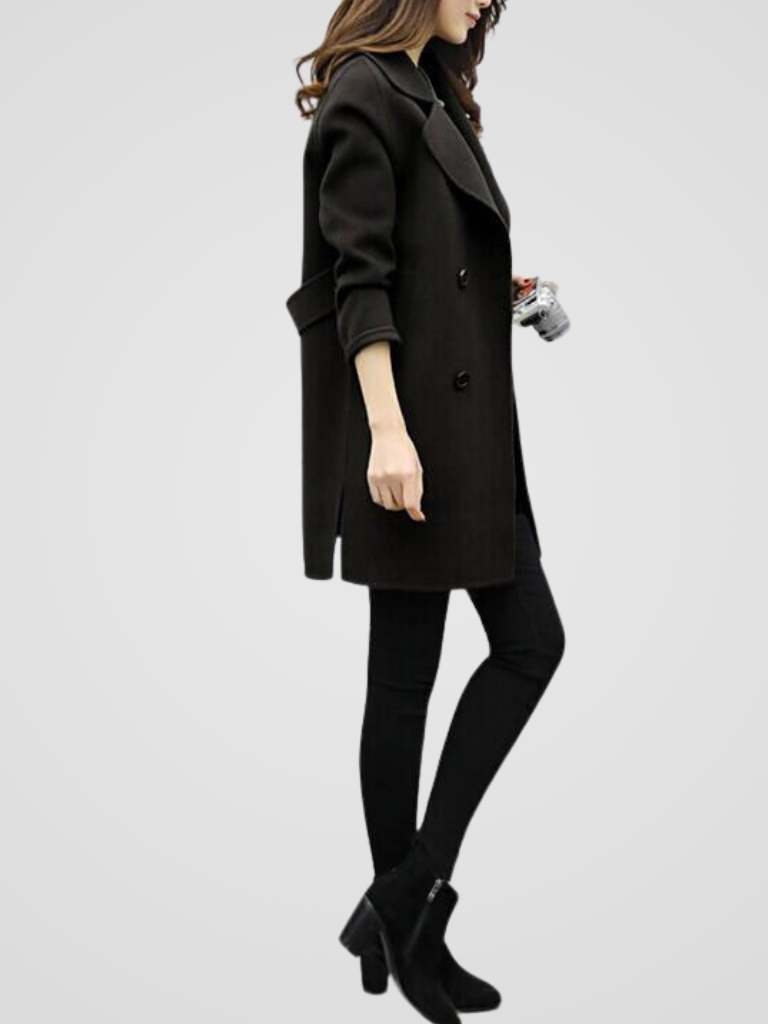 Stylish women's longline coat, double-breasted, showcasing elegant design for classic winter fashion.