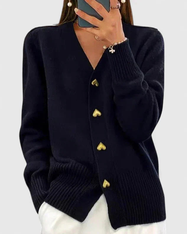 Elegant women's drape cardigan featuring charming heart buttons, perfect for versatile layering.