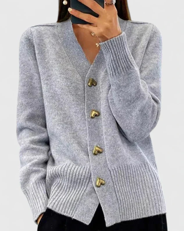 Comfortable women's long-sleeve drape cardigan, a fall essential with chic charm buttons.
