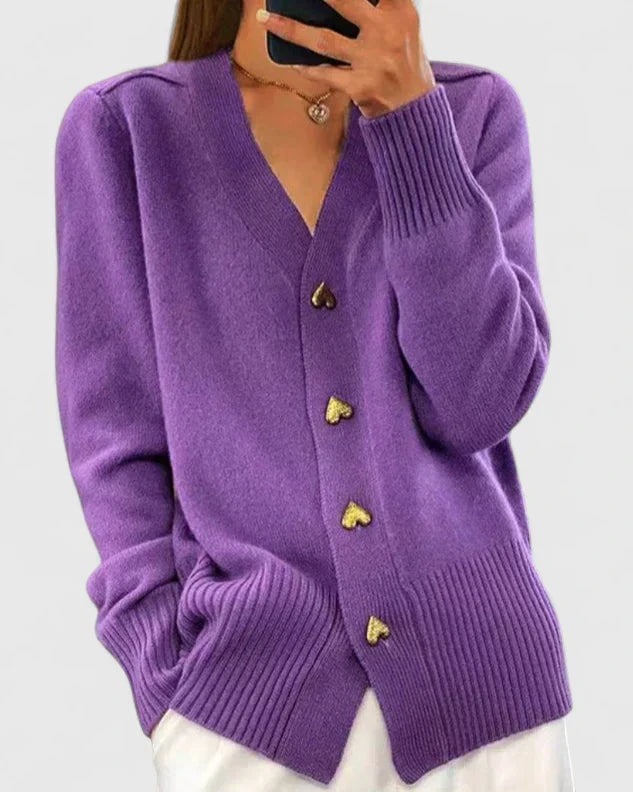 Versatile women's drape cardigan, an elegant layer for spring or fall with delicate charm buttons.