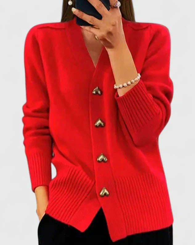 Chic women's drape cardigan with unique heart-shaped charm buttons, ideal for casual elegance.