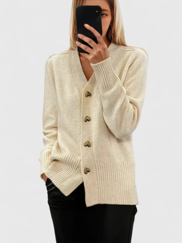 Fashionable women's drape cardigan, an everyday comfort essential with charming button details.