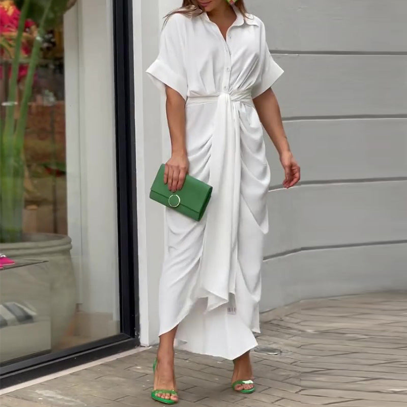 Comfortable women's short sleeve midi dress with elegant drape. Ideal casual summer or spring vacation outfit.