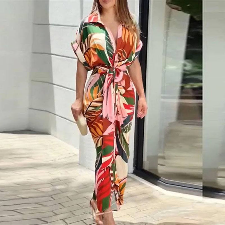 Versatile women's flowy midi summer dress, featuring an elegant drape for comfortable, stylish wear. Vacation ready.