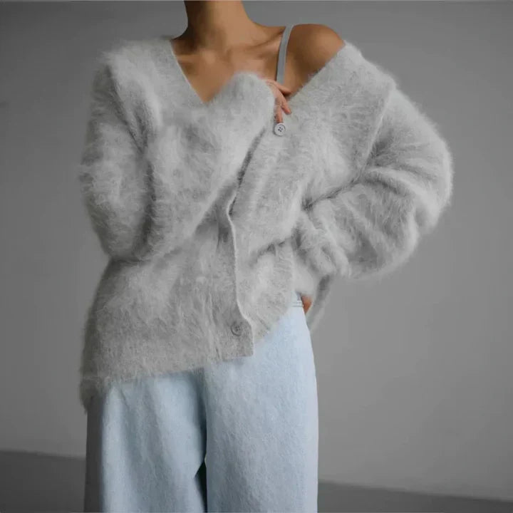 Soft women's elegant cardigan, draped wrap for cozy everyday layering.
