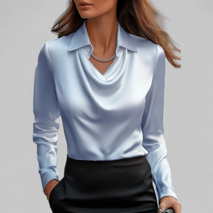 Fashionable women's draped neck long sleeve top, providing a chic and versatile option for women.