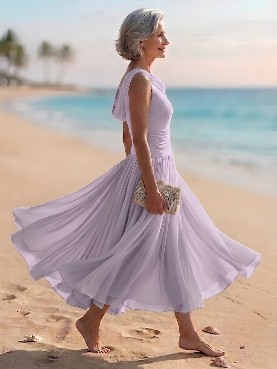 Stylish sleeveless pleated A-line women's midi dress with a draped neck, perfect for formal occasions.