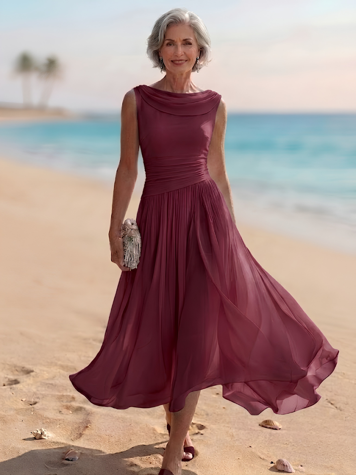 Formal women's midi dress: sleeveless with a draped neck & sophisticated pleated A-line design for parties.