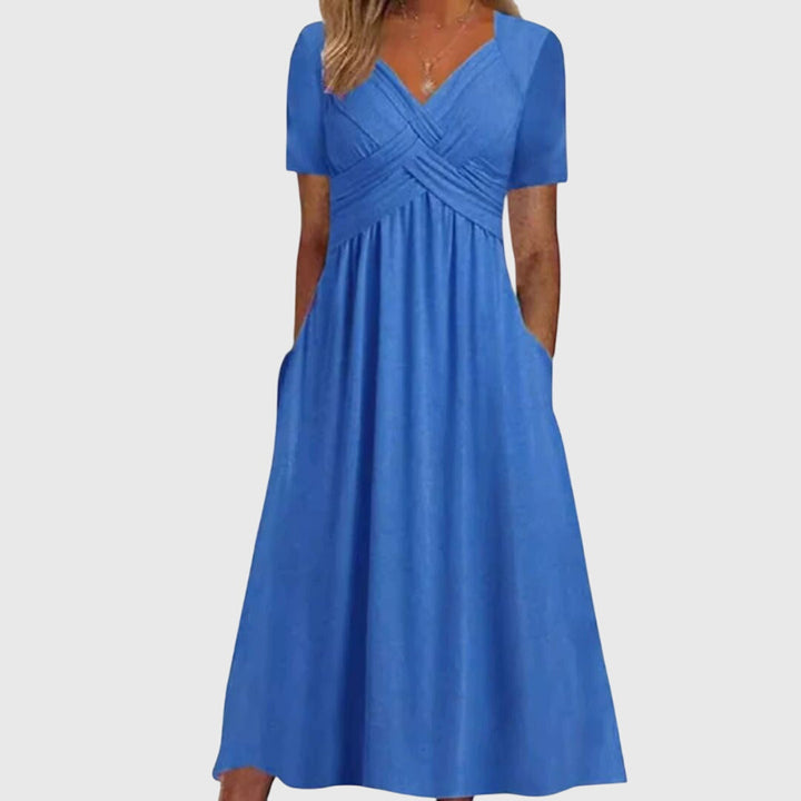 Chic women's cocktail dress, flattering and versatile for special occasions or evening parties.