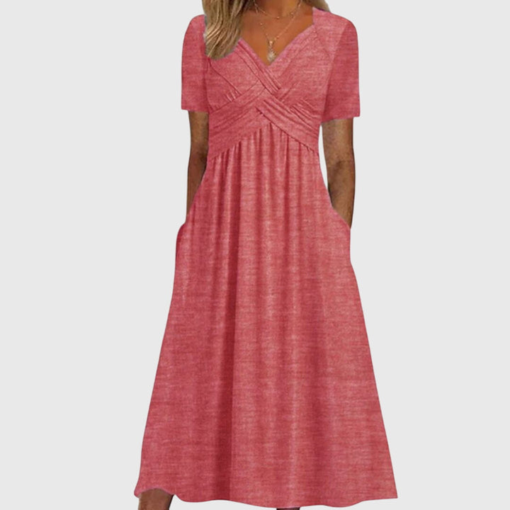 Women's elegant dress showcasing a flattering silhouette, ideal for evening galas and cocktail parties.