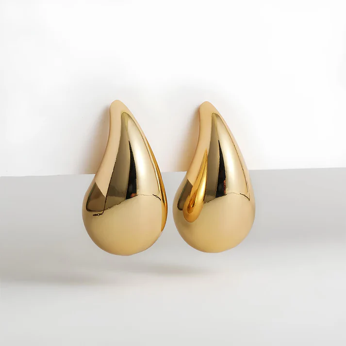 Elegant women's drop earrings, perfect fashion accessory. Fine jewelry gift for her.