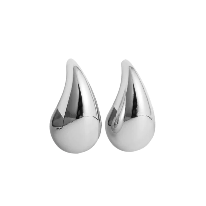Versatile elegant drop earrings for women. Gold or silver fine jewelry, a perfect fashion accessory for any occasion.