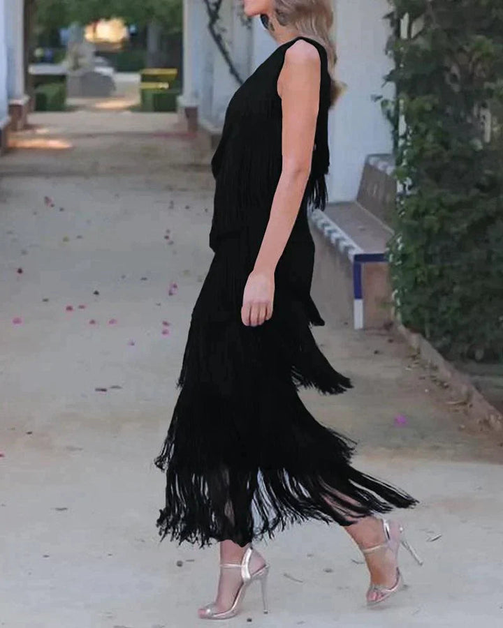 Graceful women's elegant long dress with dropped shoulders, offering a sophisticated silhouette for parties.