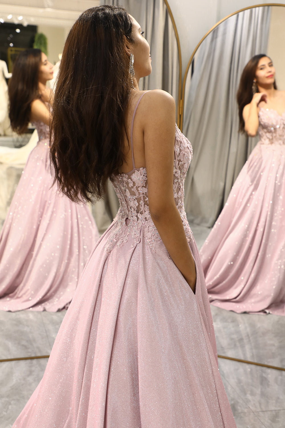 Sparkling embellished women's maxi dress, ideal wedding guest attire, formal party or special occasion.