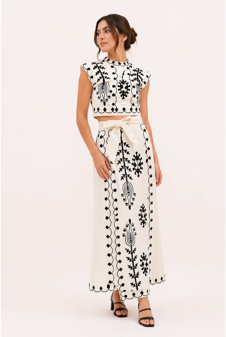 Elegant women's embroidered fringe co-ord set, a chic two-piece summer outfit for sophisticated occasions.
