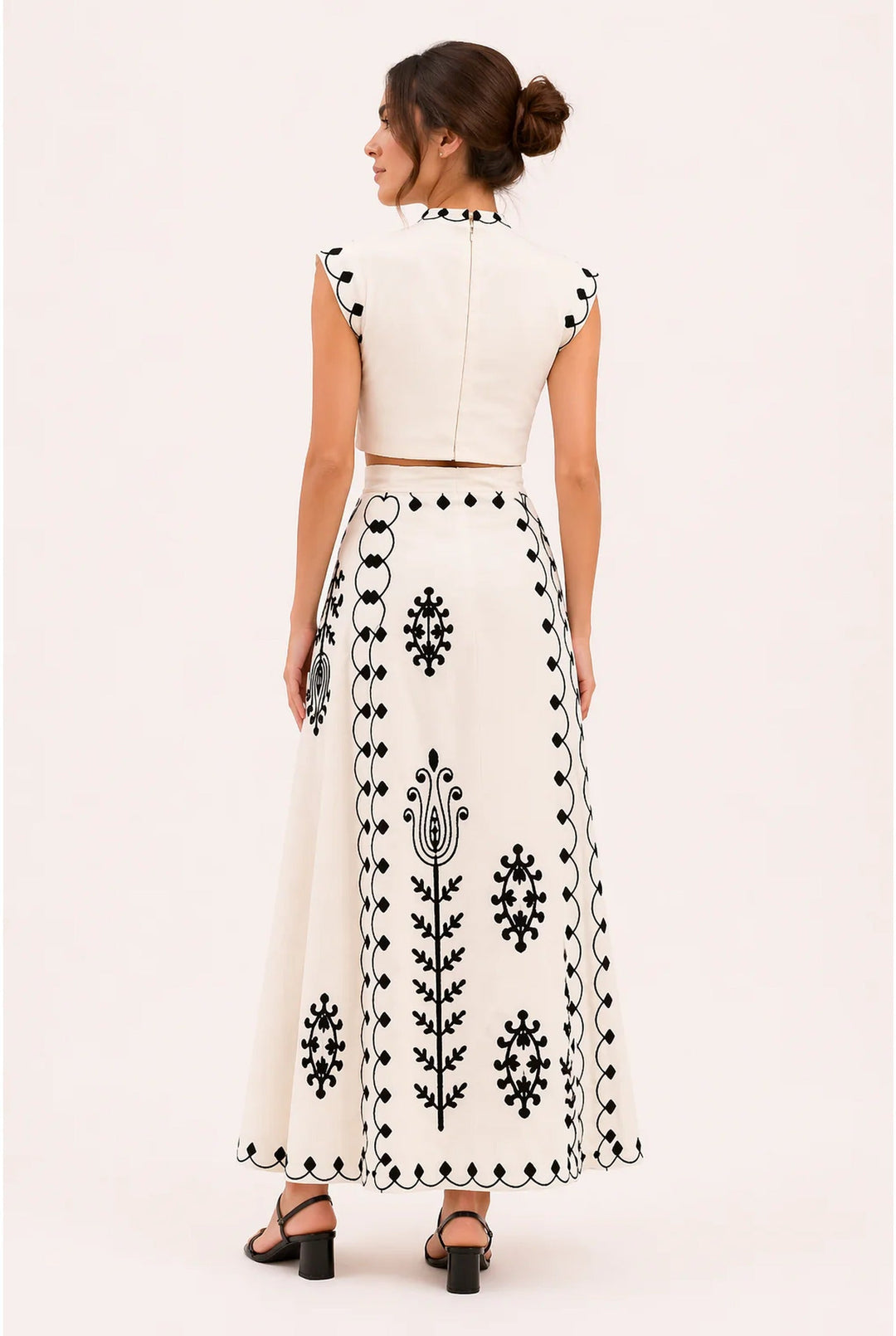 Chic women's fringe co-ord set with intricate embroidery. Perfect elegant two-piece summer outfit for parties.