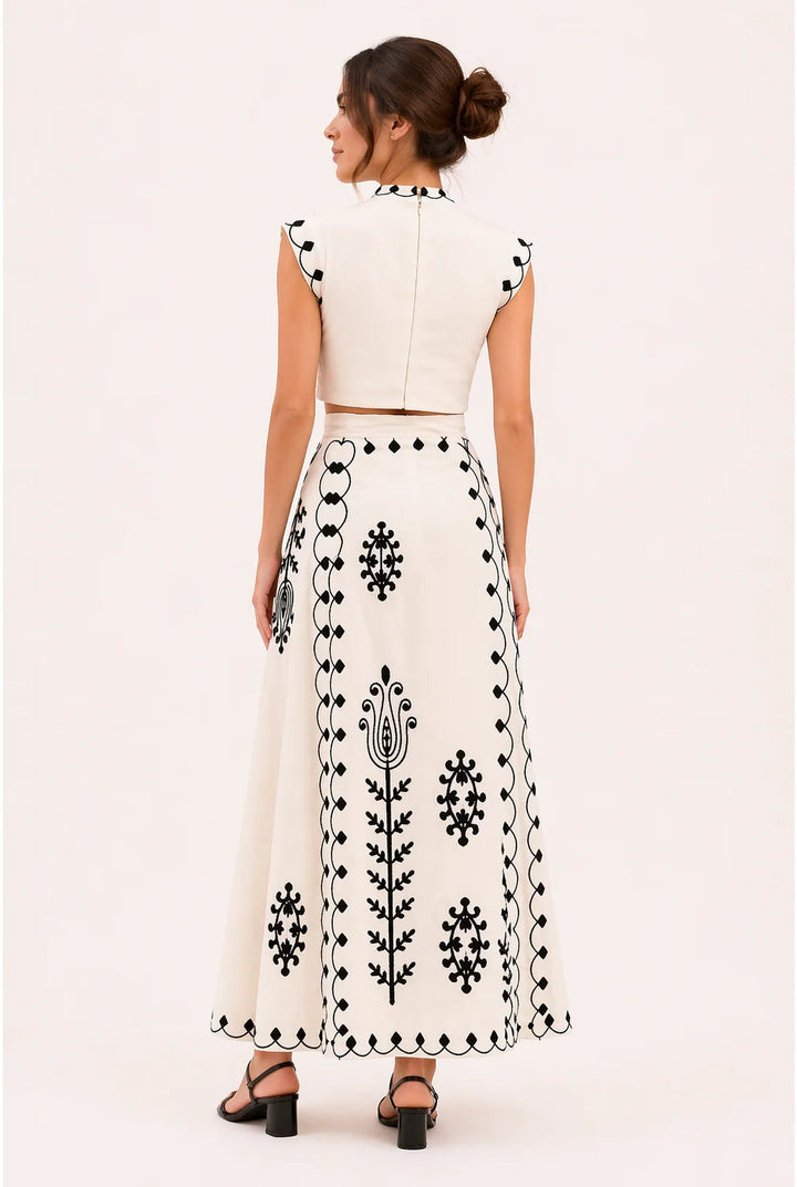 Chic women's fringe co-ord set with intricate embroidery. Perfect elegant two-piece summer outfit for parties.