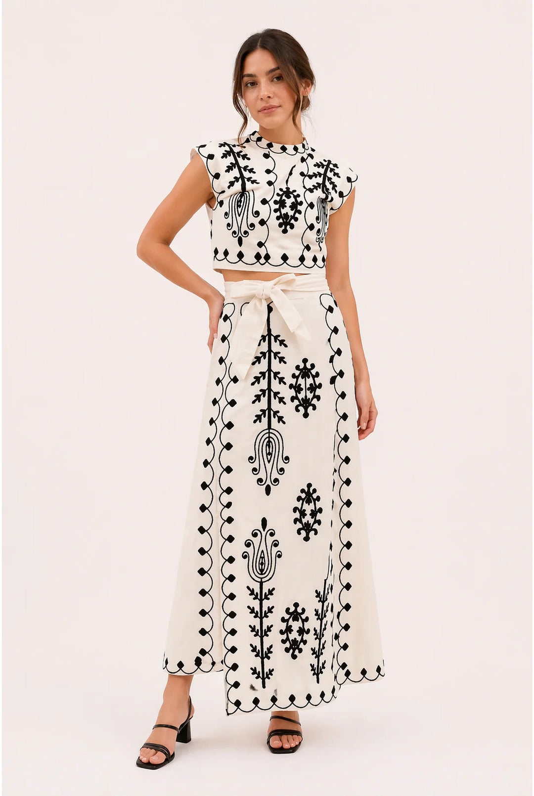 Stylish women's embroidered co-ord set featuring playful fringe. An elegant summer two-piece for party wear.