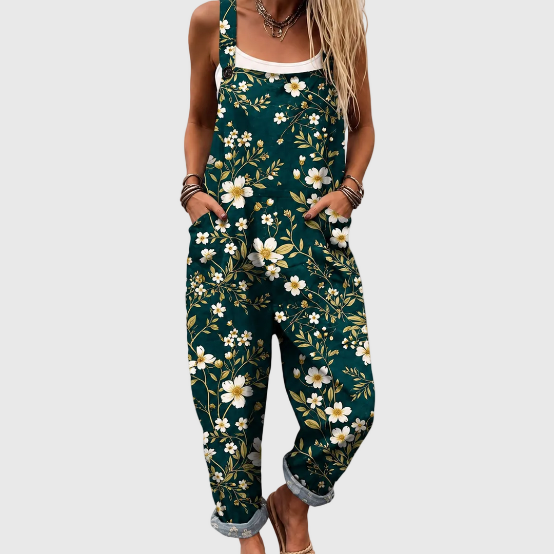 Elegant women's emerald green floral wide-leg jumpsuit. Perfect for summer vacations, offering comfort & chic style.