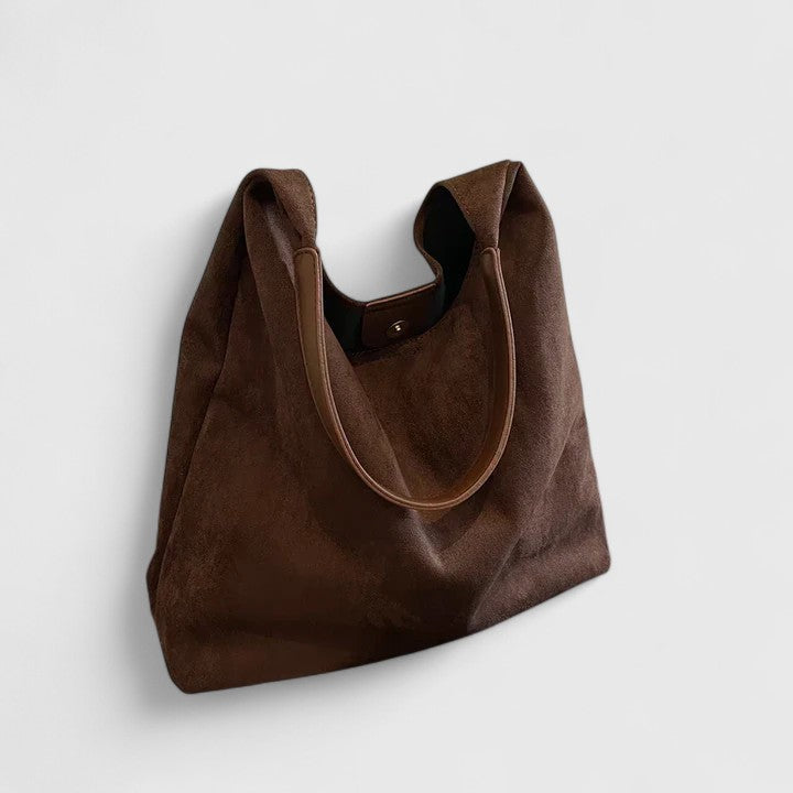 Fashionable women's tote bag. Spacious everyday handbag with an elegant, stylish design.