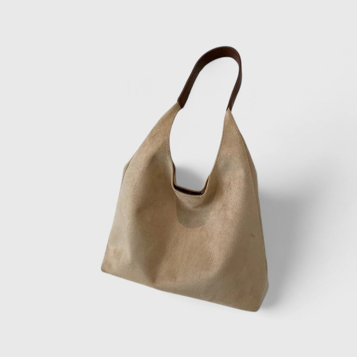 Modern women's chic tote bag. Spacious everyday handbag designed for style and functionality.