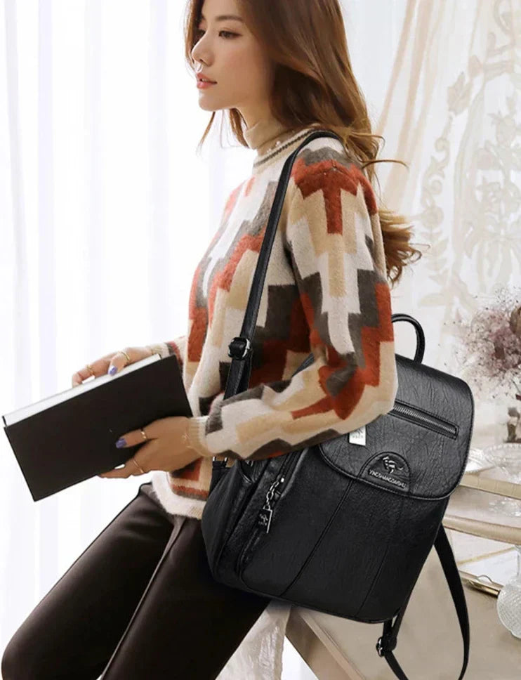 Versatile women's daily use backpack. Durable & spacious, ideal for work, travel, or casual outings. Fashionable rucksack.