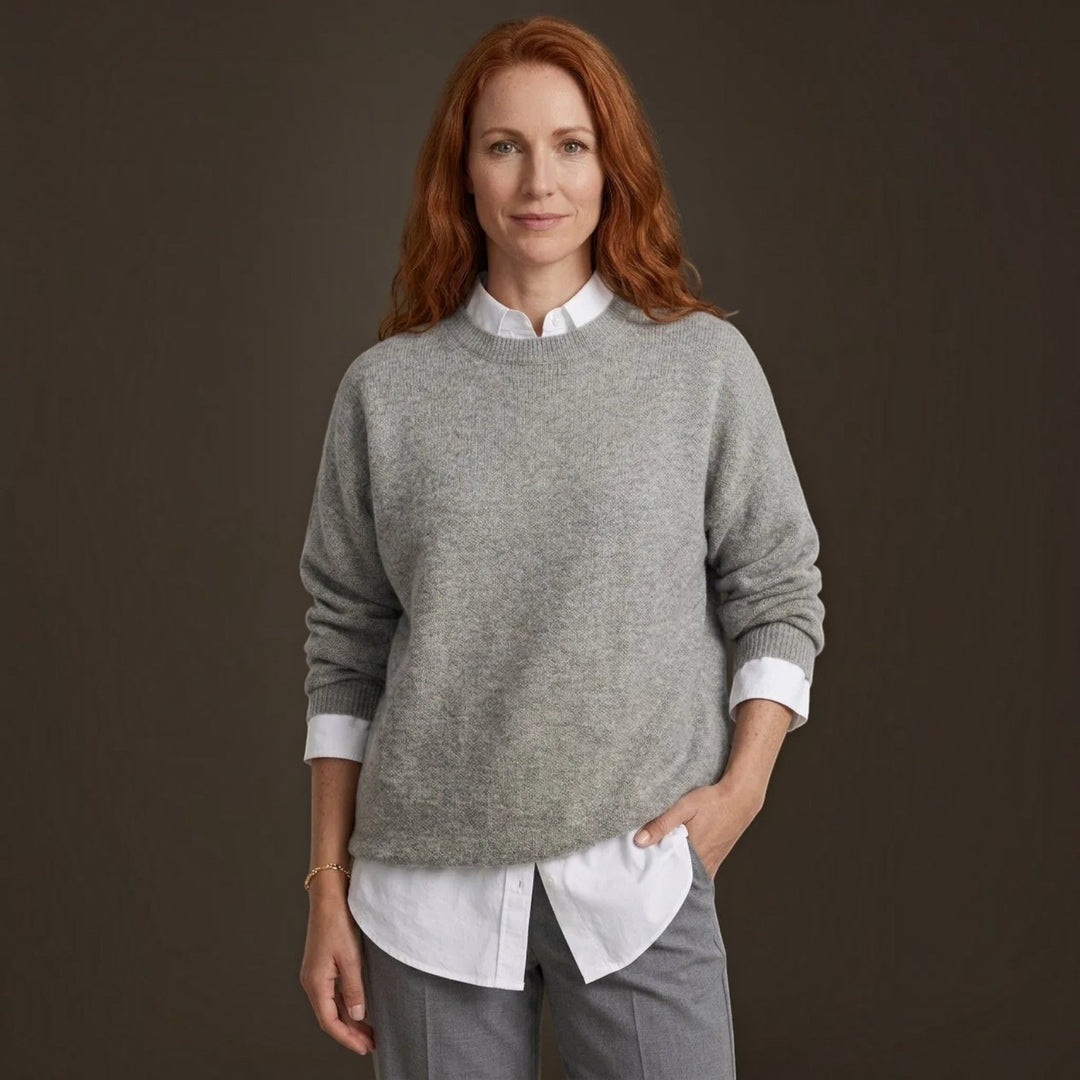 Elegant women's fine knit pullover sweater. Perfect for all seasons, offering versatile & comfortable everyday wear.