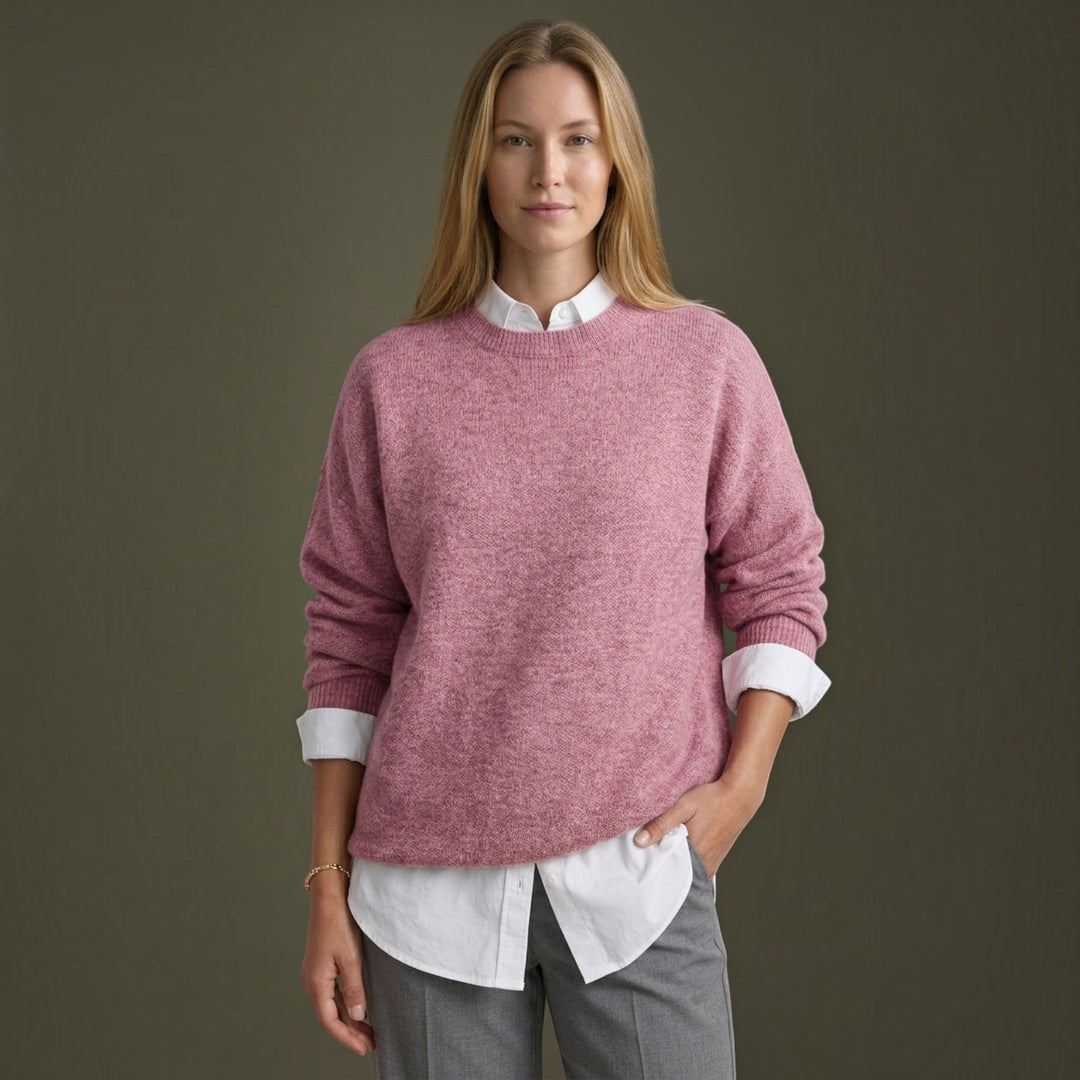 Elegant long sleeve fine knit pullover for women. A versatile and comfortable choice for a chic fall outfit.