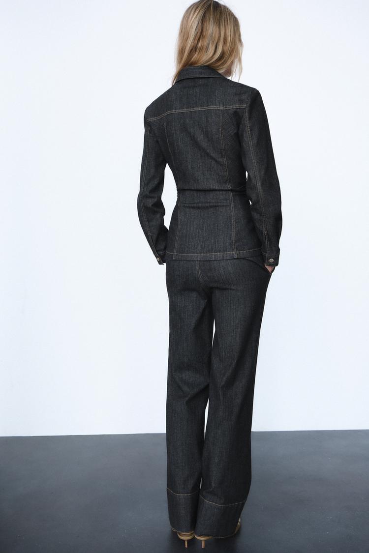 Fashionable women's matching set: fitted top with unique detail & versatile stylish trousers for smart casual wear.